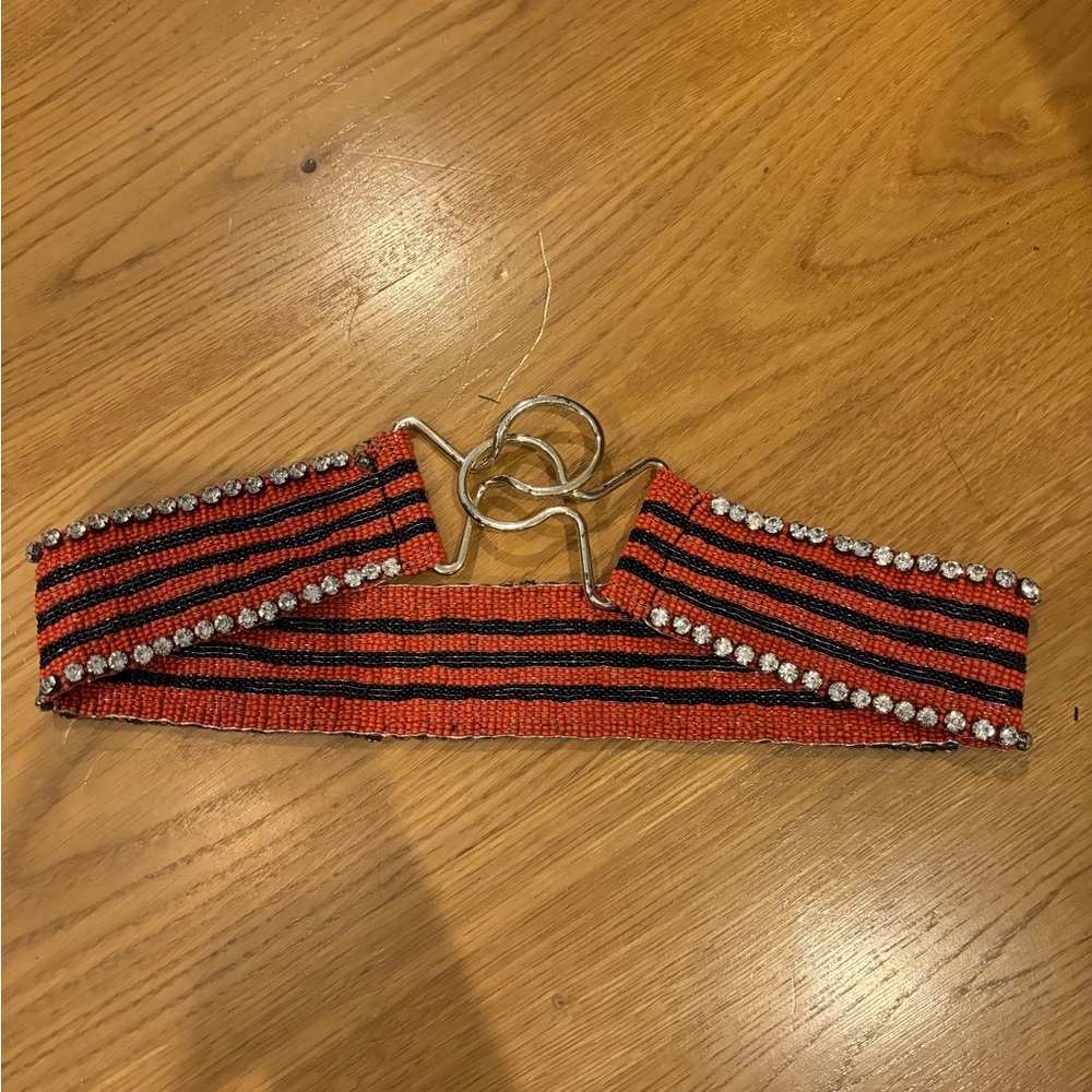 Beaded belt with gold clasp